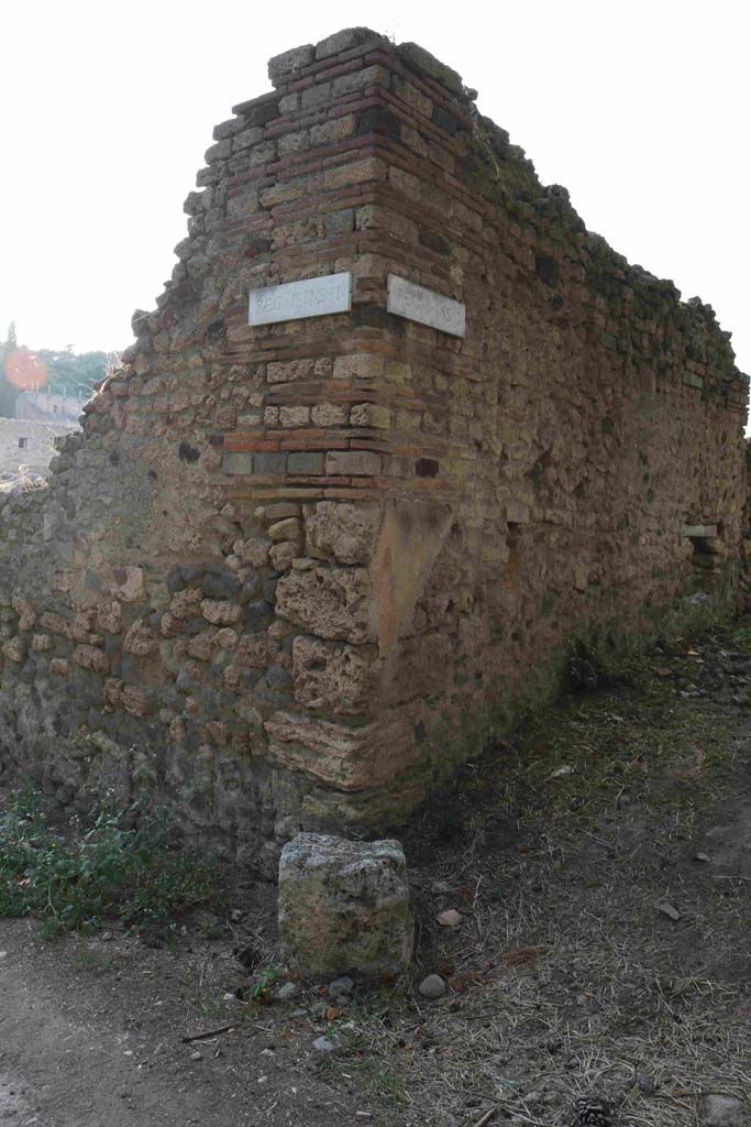 Pompeii, street altar near 1.1.10. September 2018.
Looking towards site of street altar at south-east corner of insula. Photo courtesy of Aude Durand.
