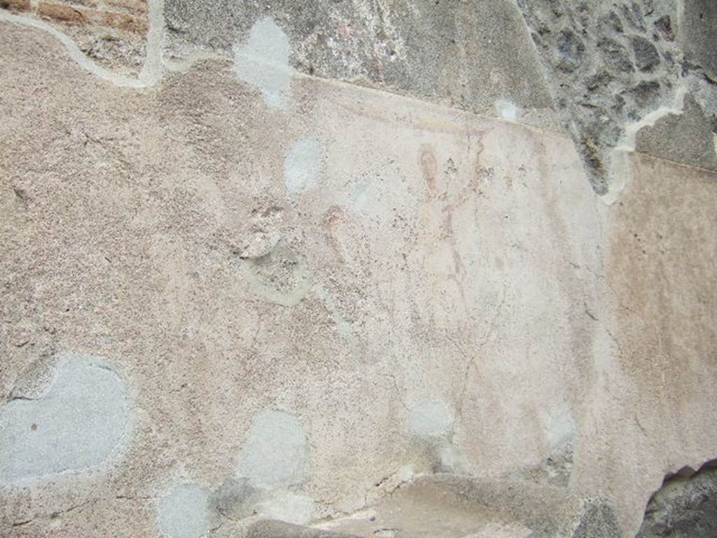 Pompeii, street altar on west side wall of I.11.1, May 2006. Painting above street altar.
Two large Lares were on the sides of a painted altar.
Each held a cornucopia and a situla (bucket).
A serpent coiled around the painted altar with its head in the fiery offering.
A garland was above each and one hung down each side.
See Fröhlich, T., 1991. Lararien und Fassadenbilder in den Vesuvstädten. Mainz: von Zabern. (F7, Taf 53,1).