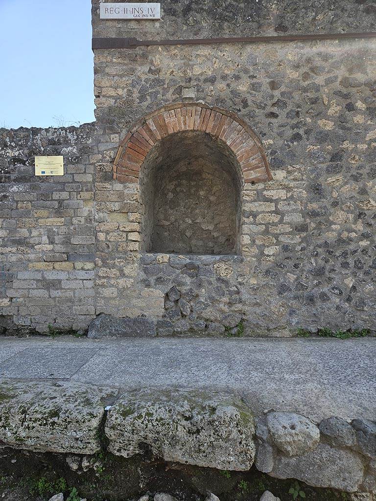 Pompeii II.4.7a. November 2024. Street shrine at east end of II.4. Photo courtesy of Annette Haug.
According to the Insula identification plaque above the street shrine, this Insula was originally known as Reg. II, Insula VII.
