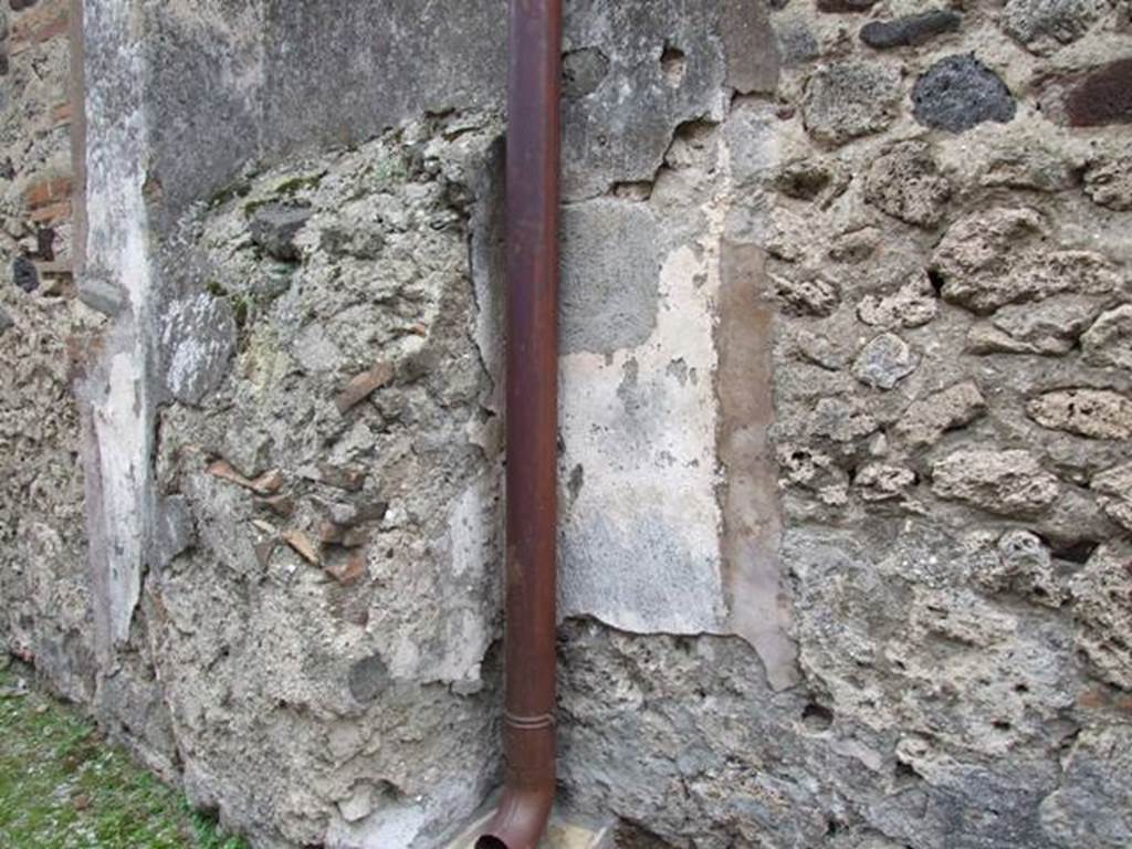 IX.2.19 Pompeii. March 2009. Buttress of masonry that may have been a street shrine.