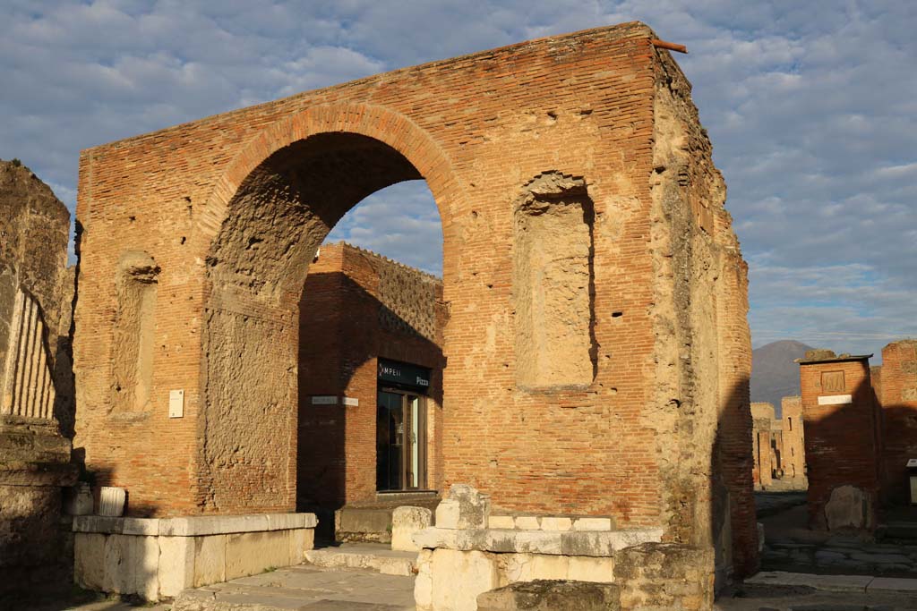 Arch at north-east end of the Forum. December 2018.
Looking north-west through arch towards the modern restaurant. Photo courtesy of Aude Durand.