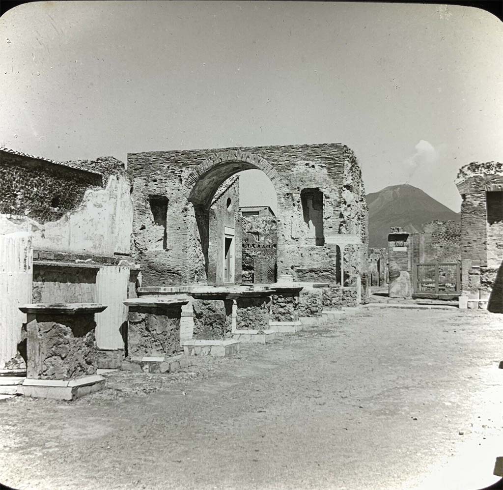 Arch at north-east end of the Forum. Late 19th / early 20th Century? Magic lantern slide.
Through the centre of the arch can be seen the buildings before the modern restaurant was built.