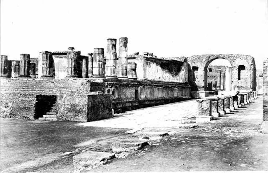 Arch at north-east end of the Forum. About 1871.
Looking north along the east side of the Forum to the arch.