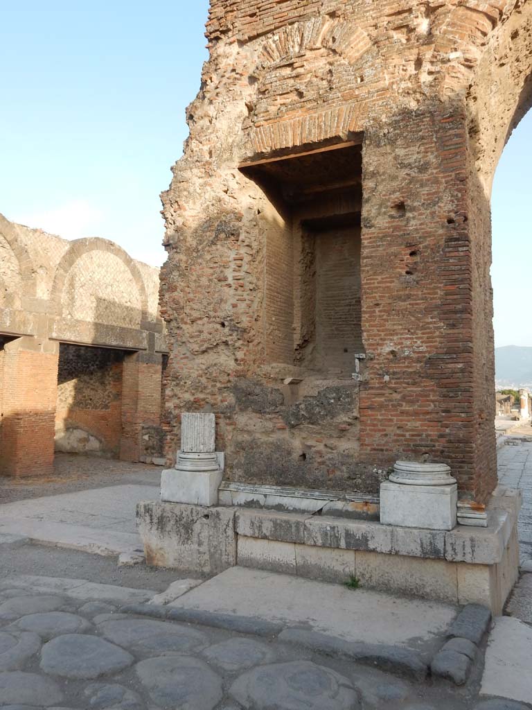 Arch at north-east end of the Forum. June 2019. East side of archway below fountain.
Looking south to remains of marble base and pillars on north face of arch. Photo courtesy of Buzz Ferebee.
