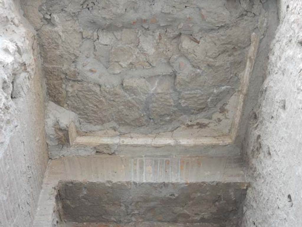 Arch at north-east end of the Forum. May 2015. Remains of fountain basin on north face of east side.
Photo courtesy of Buzz Ferebee.