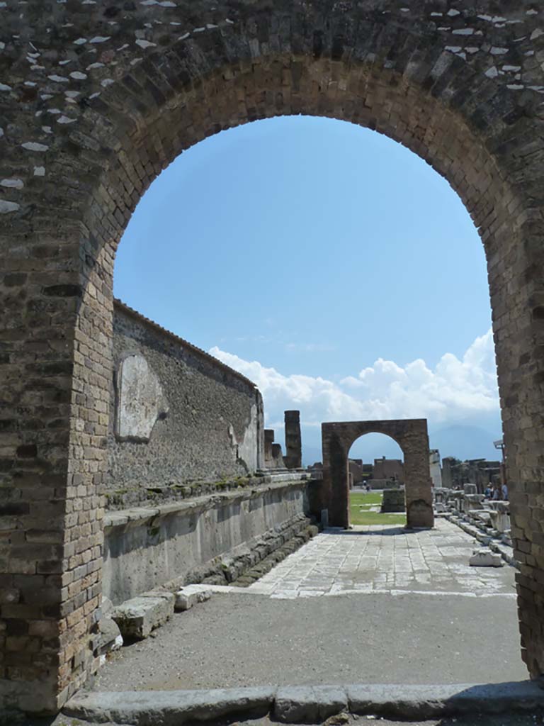 Arched entrance in north-west corner of Forum. May 2010.
Looking south through arch towards the Arch of Augustus.