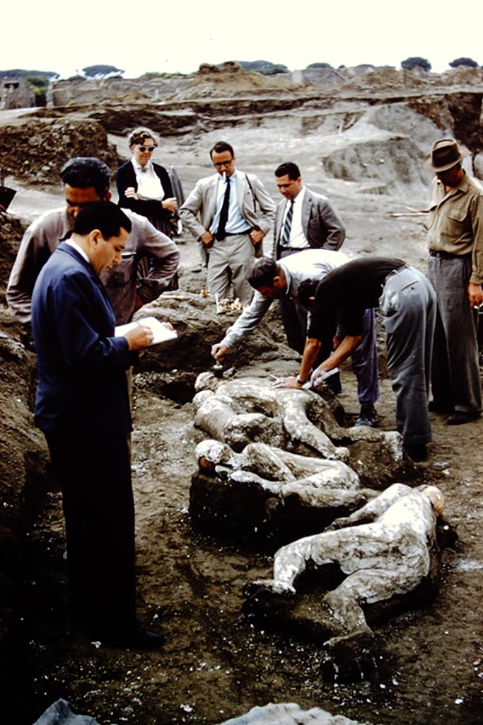 1.21.6 Pompeii. 1961. Wilhelmina watching the finding of the fugitives 45, 44, 46, 47. Photo by Stanley A. Jashemski.
Source: The Wilhelmina and Stanley A. Jashemski archive in the University of Maryland Library, Special Collections (See collection page) and made available under the Creative Commons Attribution-Non-Commercial License v.4. See Licence and use details.
J61f0381