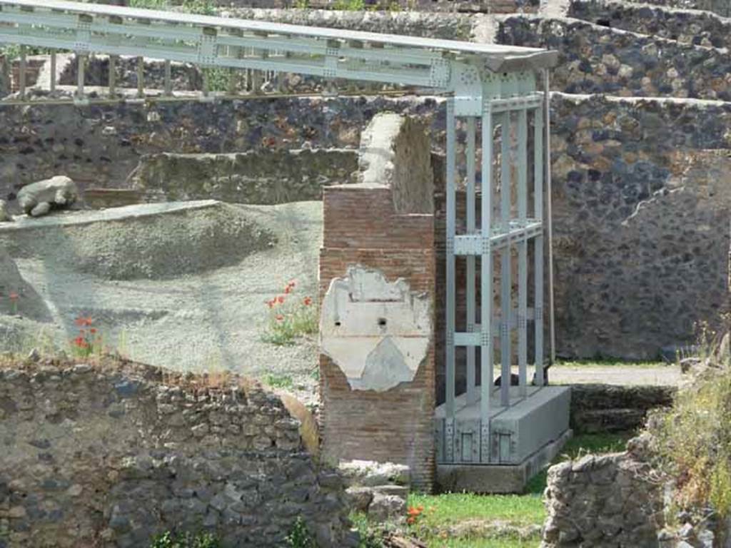 I.22.1 Pompeii. May 2010. Looking north to the lapilli and remains of a cast.