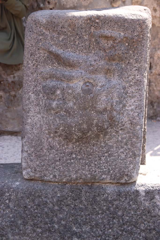 Fountain outside I.12.2 on Via dell’ Abbondanza. September 2019.
Pilaster with relief of Satyr on rock-fountain or water source.
Photo courtesy of Klaus Heese.