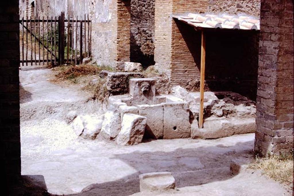 Fountain at 1.13.10. Pompeii. 1972. Looking west across Via di Nocera. Photo by Stanley A. Jashemski.
Source: The Wilhelmina and Stanley A. Jashemski archive in the University of Maryland Library, Special Collections (See collection page) and made available under the Creative Commons Attribution-Non Commercial License v.4. See Licence and use details. J72f0397