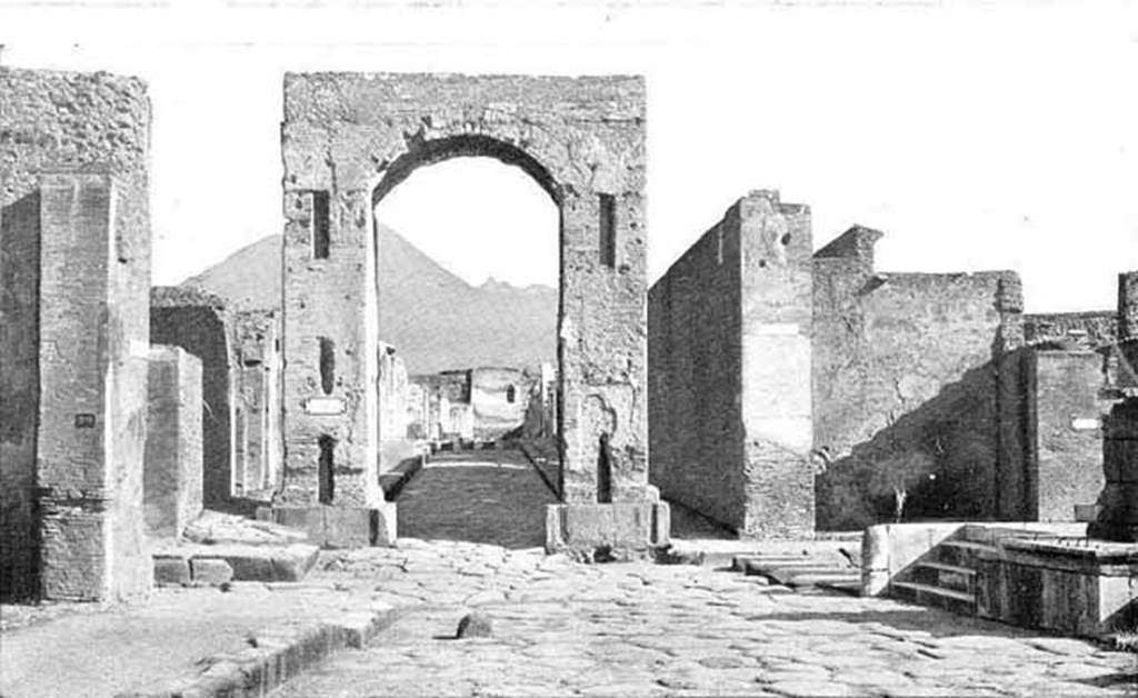 Arch of Caligula. About 1900. South side, looking north to Tower XI, the Tower of Mercurio.
Photo courtesy of Rick Bauer.
D’apres Thedenat, Les arcs de triomphe de Tibère au Forum et de la rue de Mercure ont été utilisés comme colonnes d'ascension pour les eaux.
On voit mème au pied de l'arc de Mercure l'arrachement des deux fontaines enlevées probablement en mème temps que les marbres du revêtement.
According to Thedenat, the triumphal arches of Tiberius at the Forum and Via Mercurio were used as ascension columns for water.
We can see also at the foot of the Arch of Mercury the site of the uprooting of the two fountains removed probably at the same time as the marbles of the cladding.
See Thedenat, H., 1906. Pompei: Vie Publique. Paris: Renouard. (Fig. 71, p. 128)
