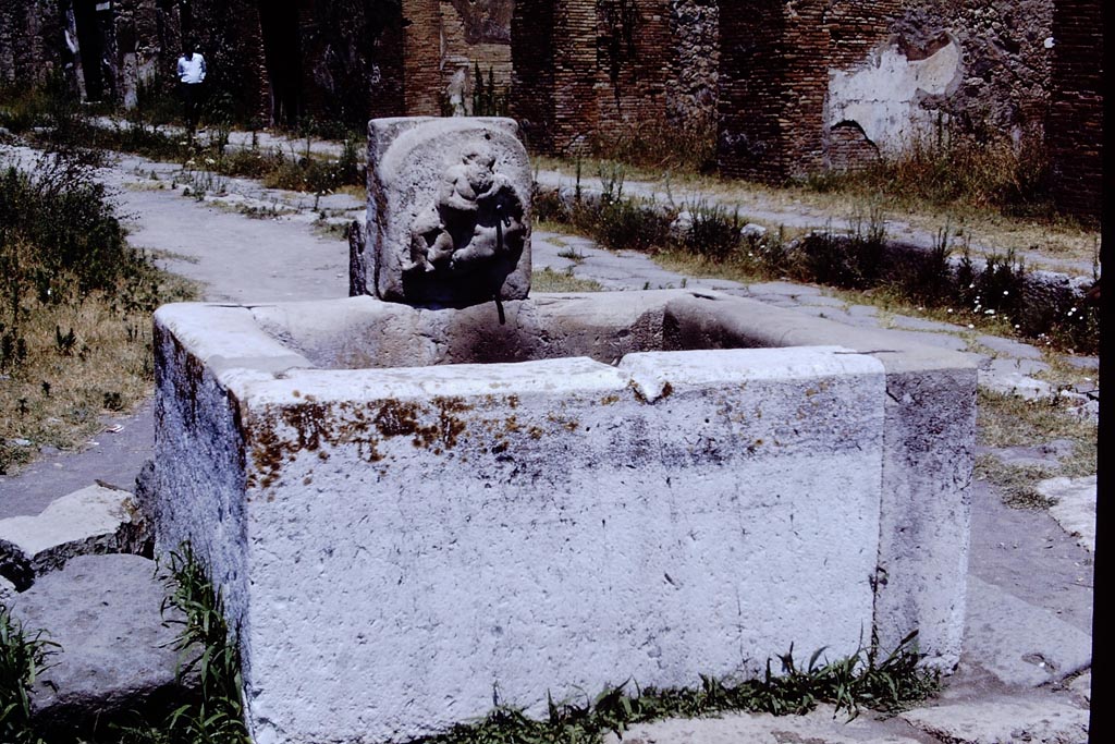 Fountain outside VI.14.17 on corner of Via della Fortuna and Via del Vesuvio, Pompeii, looking north. 1968. Photo by Stanley A. Jashemski.
Source: The Wilhelmina and Stanley A. Jashemski archive in the University of Maryland Library, Special Collections (See collection page) and made available under the Creative Commons Attribution-Non Commercial License v.4. See Licence and use details.
J68f1009