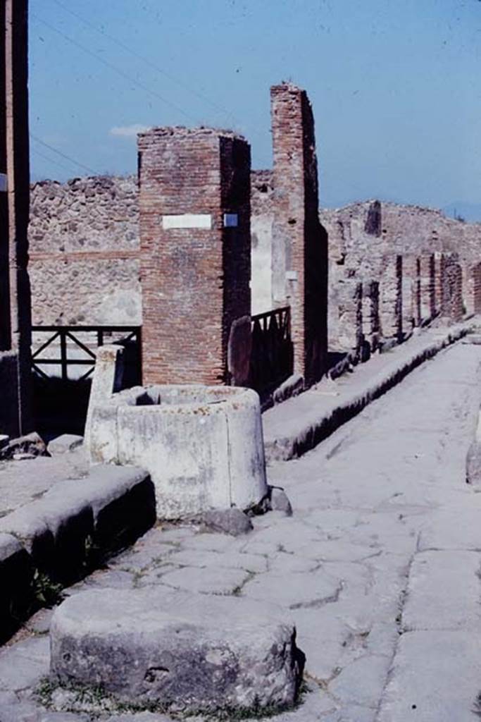 Fountain outside VII.4.32, Pompeii. 1968. Looking south-east along Via degli Augustali.
Note that the modern tap block front is not present at the rear.
Photo by Stanley A. Jashemski.
Source: The Wilhelmina and Stanley A. Jashemski archive in the University of Maryland Library, Special Collections (See collection page) and made available under the Creative Commons Attribution-Non Commercial License v.4. See Licence and use details.
J68f1645