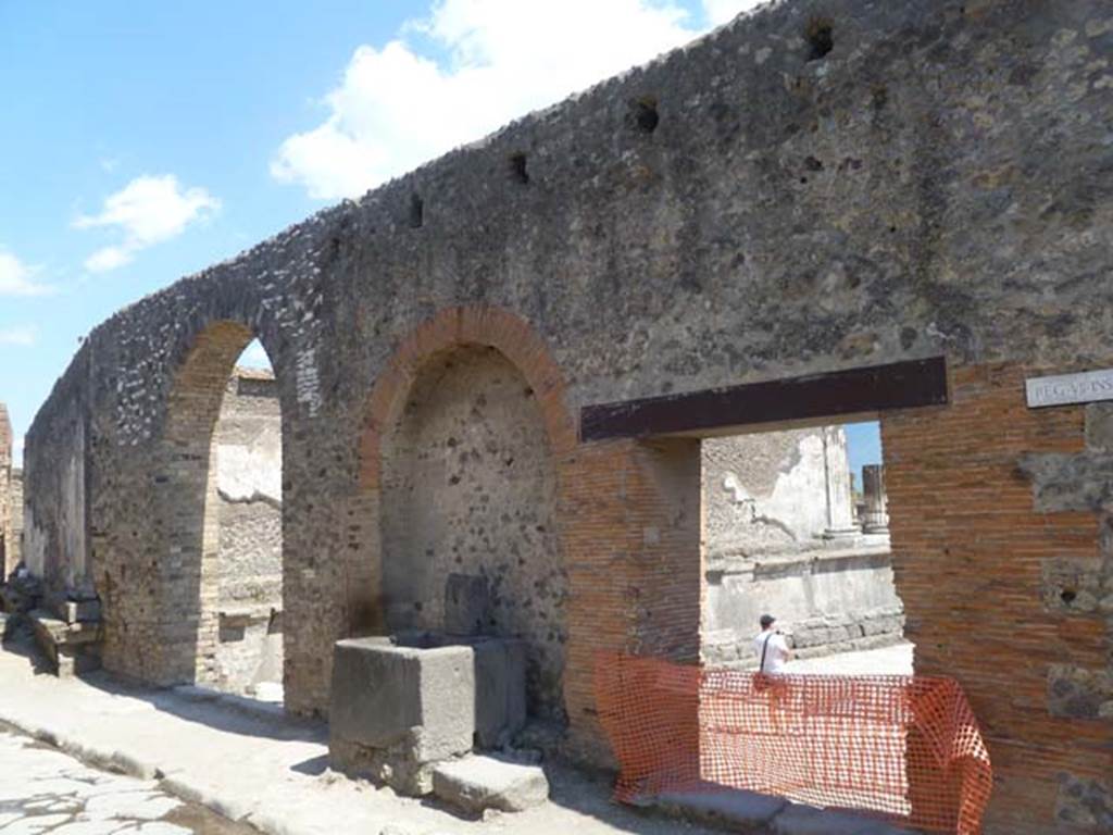 VII.8 Forum. May 2011. Fountain outside north wall of Forum on Vicolo dei Soprastanti, next to entrance VII.7.26. Photo courtesy of Michael Binns.