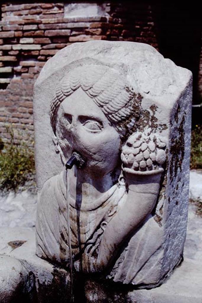 Fountain outside VII.9.67 and VII.9.68, Pompeii. 1968. Fountain with head of Fortuna.
Photo by Stanley A. Jashemski.
Source: The Wilhelmina and Stanley A. Jashemski archive in the University of Maryland Library, Special Collections (See collection page) and made available under the Creative Commons Attribution-Non Commercial License v.4. See Licence and use details.
J68f1197