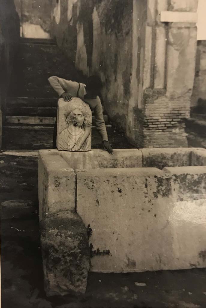 VII.9.67 Pompeii, 1944. Fountain and rear steps leading up to Eumachia’s building.
Photo courtesy of Rick Bauer.
(This photo was in an album belonging to a sailor assigned to Patrol Squadron 63 (VP-63).)