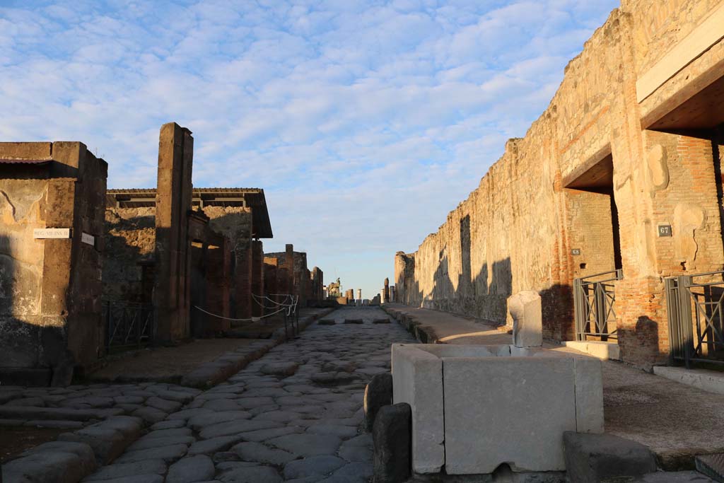 Fountain outside VII.9.67. Via dell’Abbondanza, Pompeii. December 2018.
Looking west between VIII.3, on left, and VII.9.68 and 67, on right. Photo courtesy of Aude Durand.
