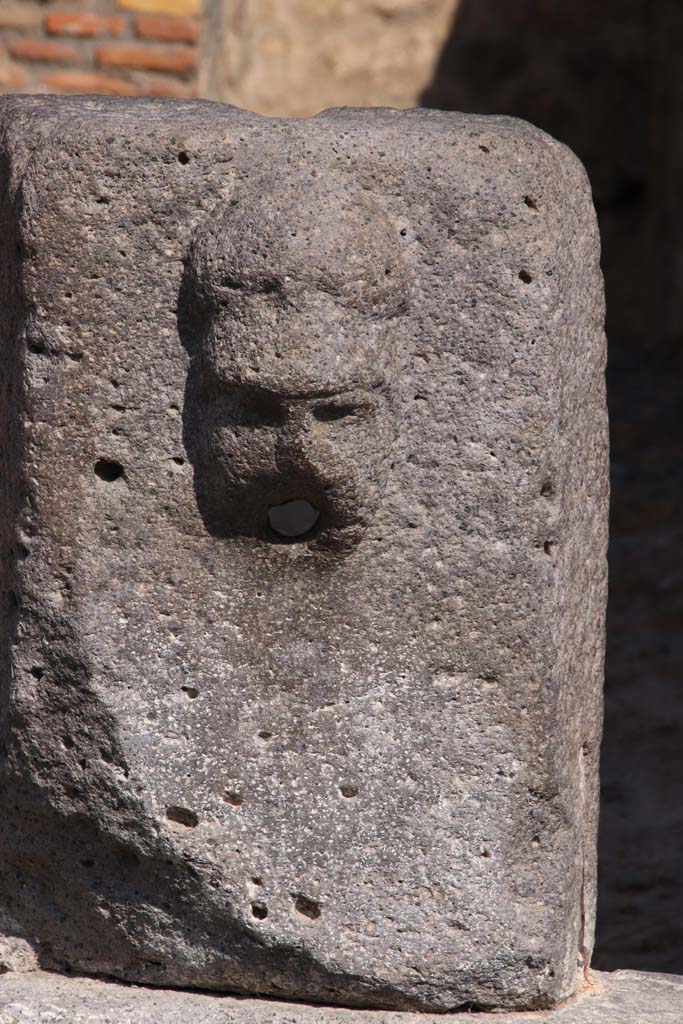 Fountain outside VII.14.13 and VII.14.14 on north side of Via dell’Abbondanza. September 2019.
Head with helmet, possibly a relief of Minerva. Photo courtesy of Klaus Heese.