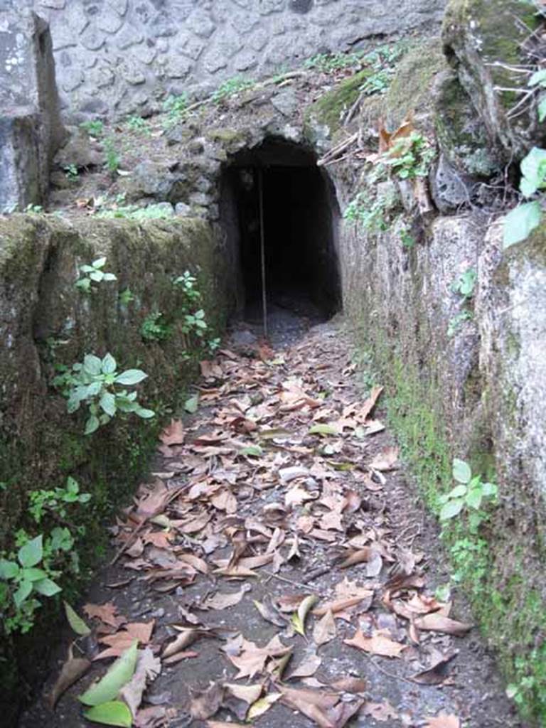 Pompeii Stabian Gate. September 2010. Looking down drain out of city south towards wall. Photo courtesy of Drew Baker.