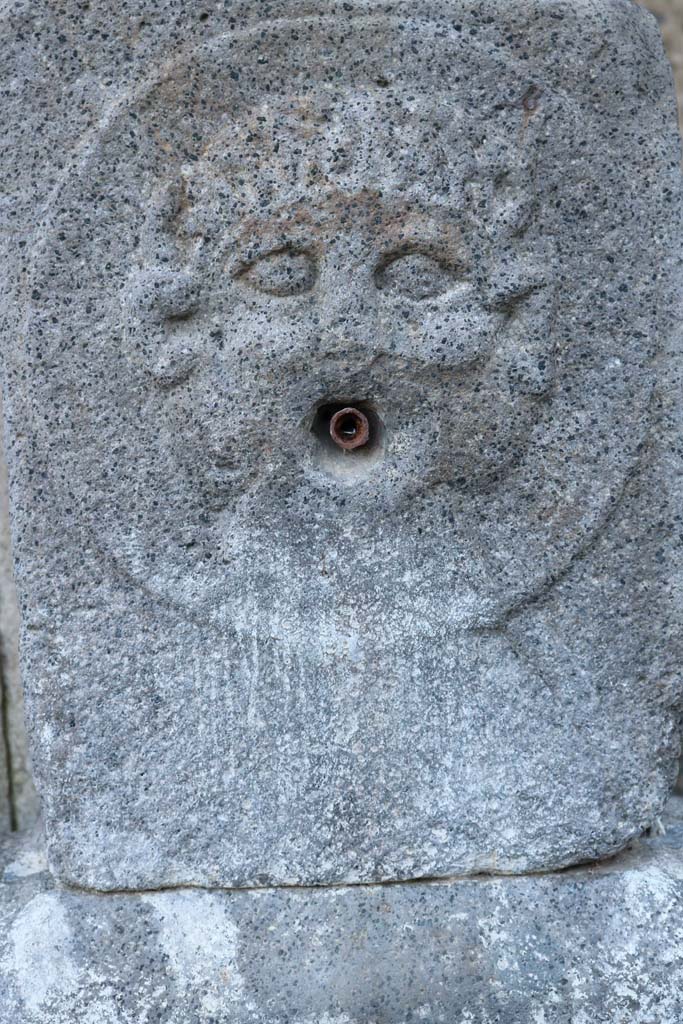 Fountain outside VIII.7.30. December 2018.
Relief of medallion with Triton on pilaster. Photo courtesy of Aude Durand.