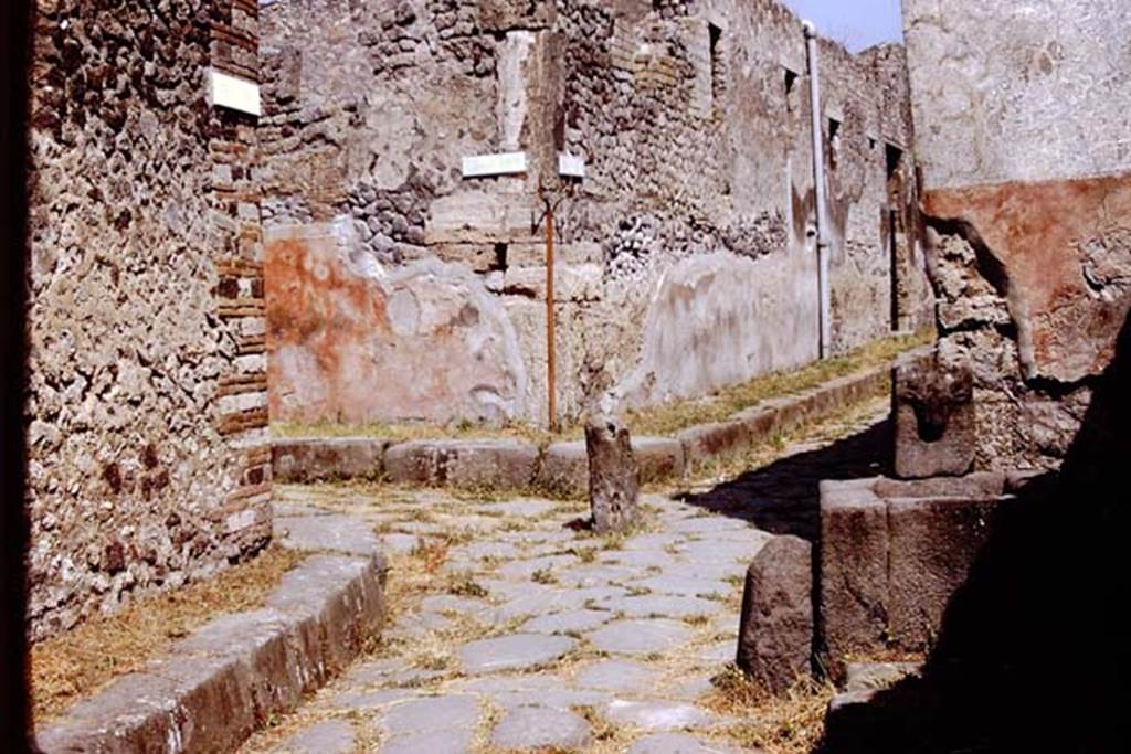 Fountain on Vicolo di Tesmo outside IX.7.17. 1972.
Looking north to junction with Vicolo di Balbo, on the left, and IX.7, on the right at rear of fountain. Photo by Stanley A. Jashemski.
Source: The Wilhelmina and Stanley A. Jashemski archive in the University of Maryland Library, Special Collections (See collection page) and made available under the Creative Commons Attribution-Non-Commercial License v.4. See Licence and use details.
J72f0112