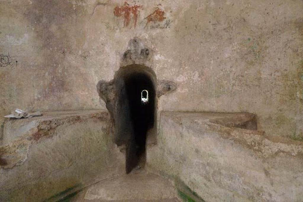 Castellum Aquae Pompeii. July 2010. Aqueduct water inlet channel in north side of water tower.
The impounding walls “a” and “b” are in front.