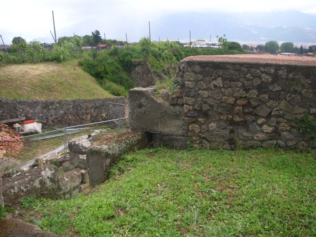 Vesuvian Gate, Pompeii. May 2010.
Looking south-east on upper area towards upper west wall of gate, in centre, and rear wall of Castellum Aquae, on right.
Photo courtesy of Ivo van der Graaff.