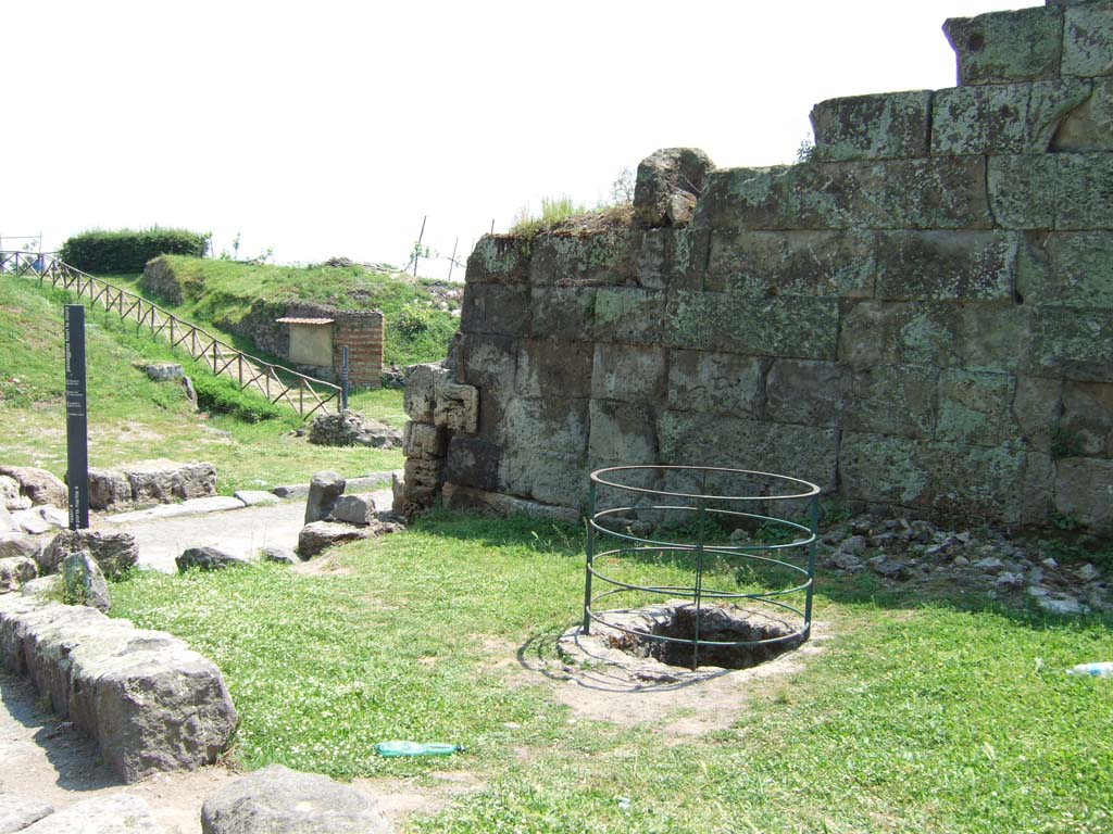 Castellum Aquae Pompeii. May 2006. Fenced water channel pit leading to Castellum Aquae. North-west side of Vesuvian Gate.