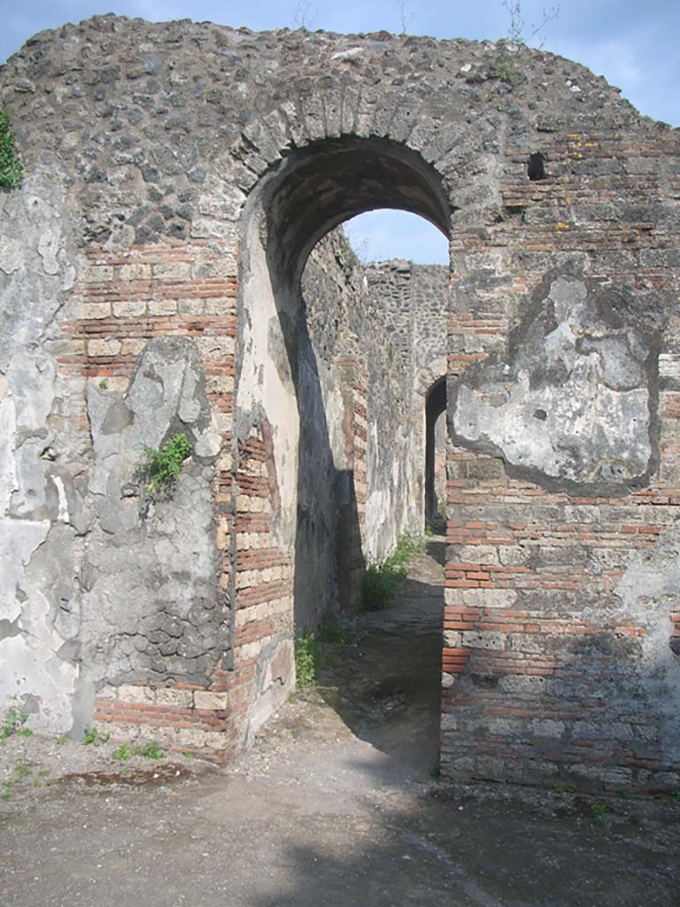 Porta Ercolano or Herculaneum Gate, Pompeii. May 2010.
Looking south through east side of gate from Via dei Sepolcri. Photo courtesy of Ivo van der Graaff.