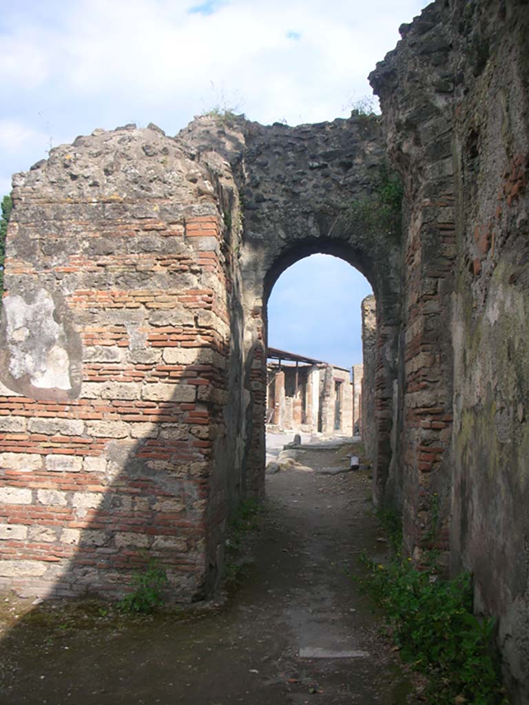 Porta Ercolano or Herculaneum Gate, Pompeii. May 2010.
Looking south towards Via Consolare through west side of gate at south end. Photo courtesy of Ivo van der Graaff.