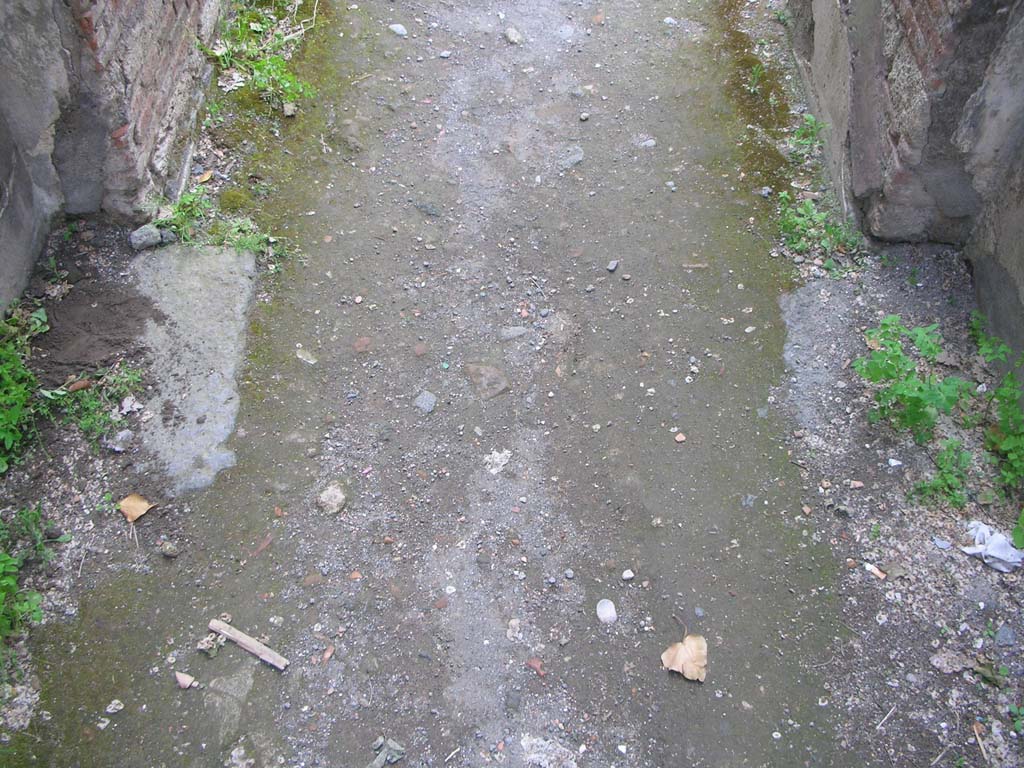 Porta Ercolano or Herculaneum Gate, Pompeii. May 2010.
Looking north across flooring in west side of gate. Photo courtesy of Ivo van der Graaff.