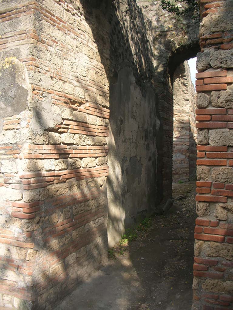 Porta Ercolano or Herculaneum Gate, Pompeii. May 2010.
Looking south towards east wall from north end of west side of gate. Photo courtesy of Ivo van der Graaff.