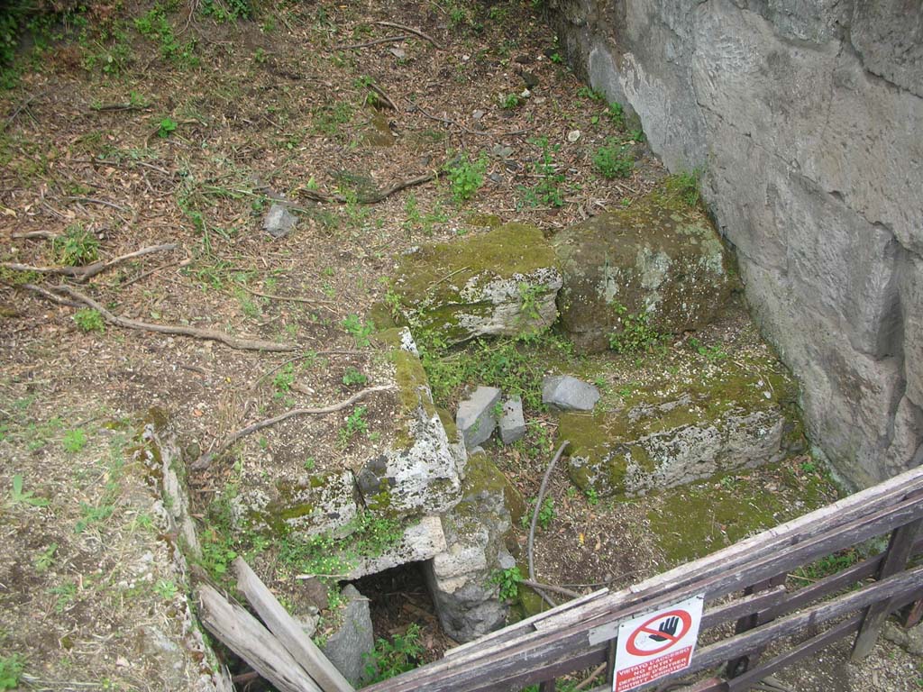 Nola Gate, Pompeii. May 2010.
Entry to drain at east end of Via di Nola, and steps on north side of Nola Gate. Photo courtesy of Ivo van der Graaff.
