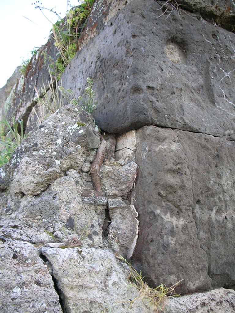 Vesuvian Gate, Pompeii. May 2010.
Detail of missile indentation from war machines of Sulla, on west side of Gate at north end. Photo courtesy of Ivo van der Graaff.