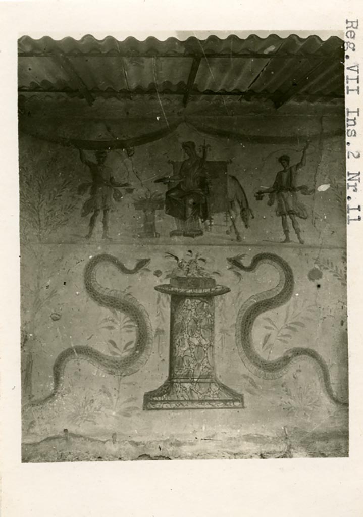 VII.12.11 Pompeii, but shown on photo as from VII.2.11. Pre-1937-39. Painted lararium on west wall.
Photo courtesy of American Academy in Rome, Photographic Archive. Warsher collection no. 952.