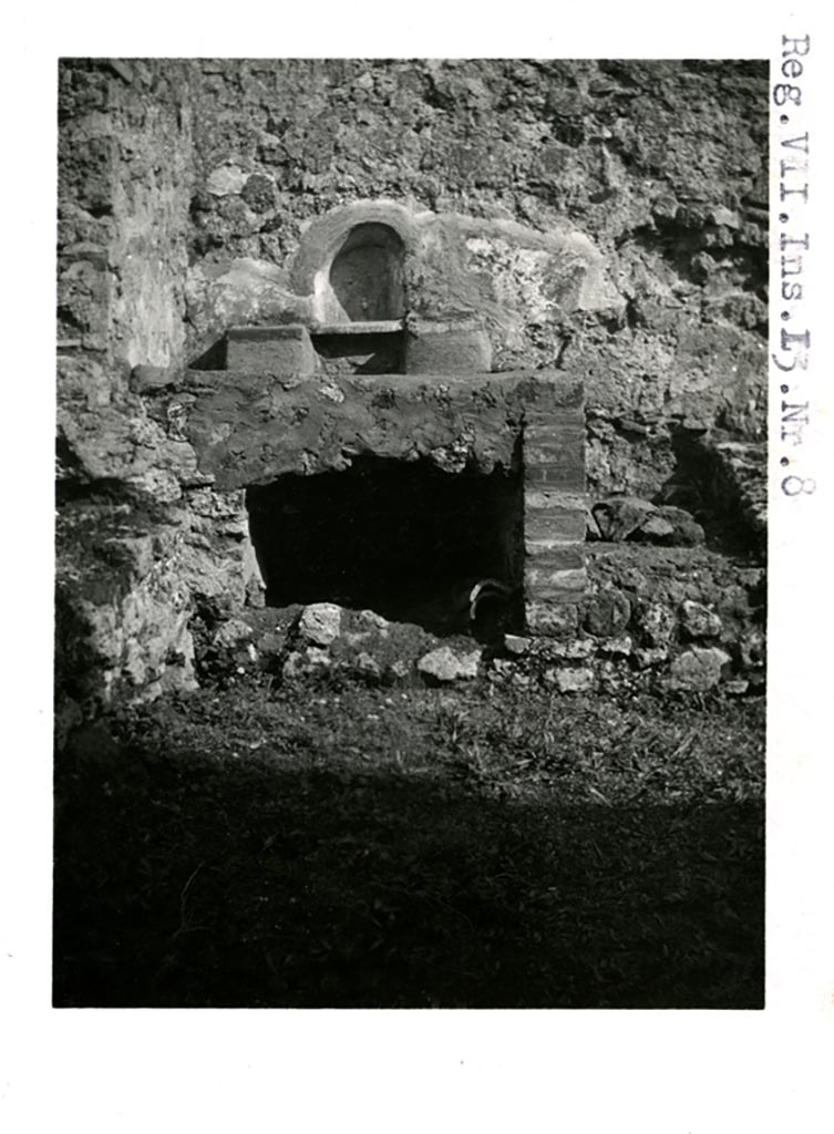 VII.13.7 Pompeii, but shown as VII.13.8 on photo. Pre-1937-39.
Looking towards niche and hearth against east wall.
Photo courtesy of American Academy in Rome, Photographic Archive. Warsher collection no. 1908.