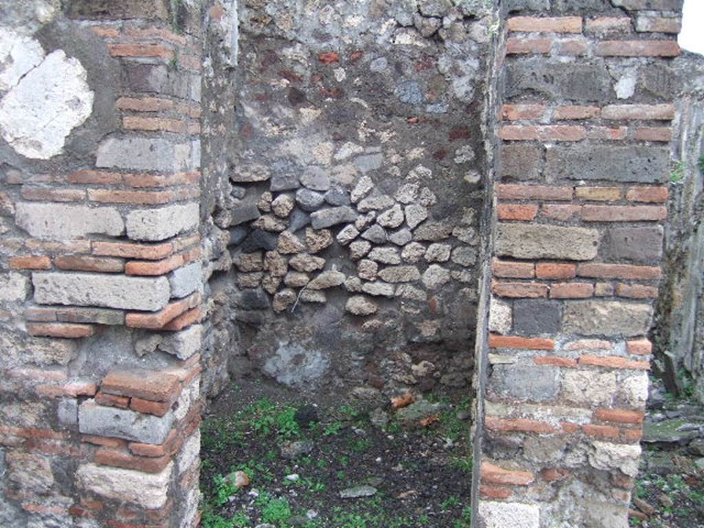 VIII.2.3 Pompeii. December 2005. Small room on north-west corner of the peristyle. According to Boyce, off the north-west corner of the peristyle opened a small room which Mazois and Fiorelli called the lararium. See Boyce G. K., 1937. Corpus of the Lararia of Pompeii. Rome: MAAR 14. (p.74, no.342)