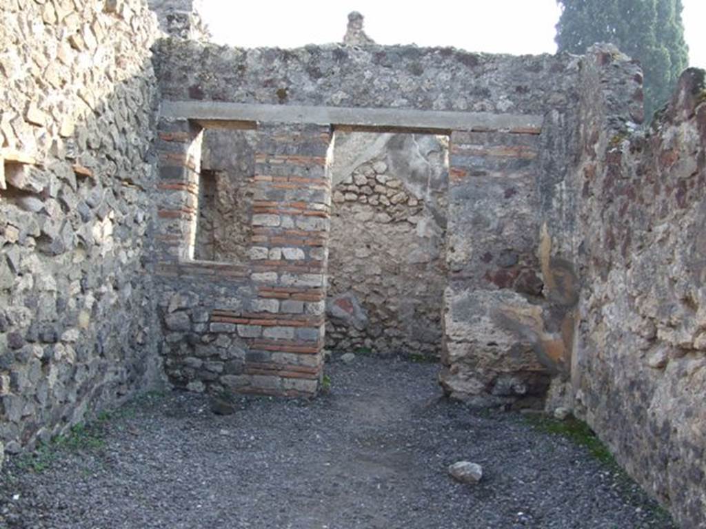 VIII.4.10 Pompeii. December 2007. Looking south to rear room.
According to Boyce –
In the south wall of the main room, a window was walled up, and a niche thus formed, to serve, according to Fiorelli, as a lararium.
Fiorelli, Giorn. Scavi, 1861, 105; Scavi, 4; Descr., 339.
See Boyce G. K., 1937. Corpus of the Lararia of Pompeii. Rome: MAAR 14. (p.76)
See Pappalardo, U., 2001. La Descrizione di Pompei per Giuseppe Fiorelli (1875). Napoli: Massa Editore. (p.128)