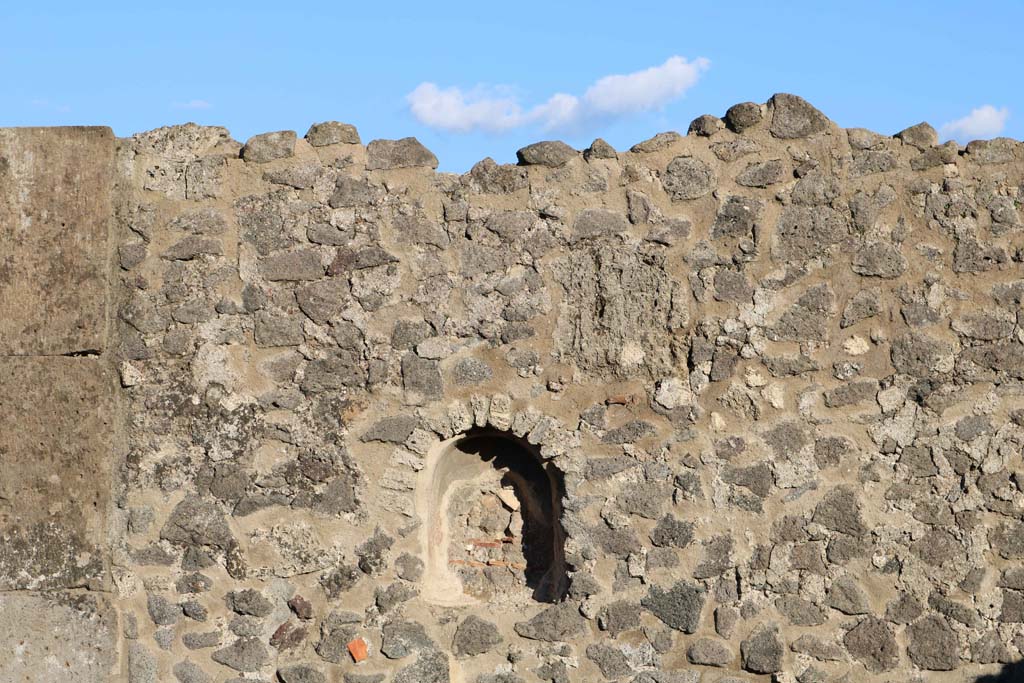 VIII.5.1 Pompeii. December 2018. Niche in east wall of shop-room. Photo courtesy of Aude Durand.
According to Boyce –
In the east wall is an arched niche (h.0.45, w.0.38, d.0.22, h. above floor 1.60), called by Fiorelli “la nicchia dei Penati”.
See Boyce G. K., 1937. Corpus of the Lararia of Pompeii. Rome: MAAR 14. (p.76, no.364)
See Pappalardo, U., 2001. La Descrizione di Pompei per Giuseppe Fiorelli (1875). Napoli: Massa Editore. (p.163).