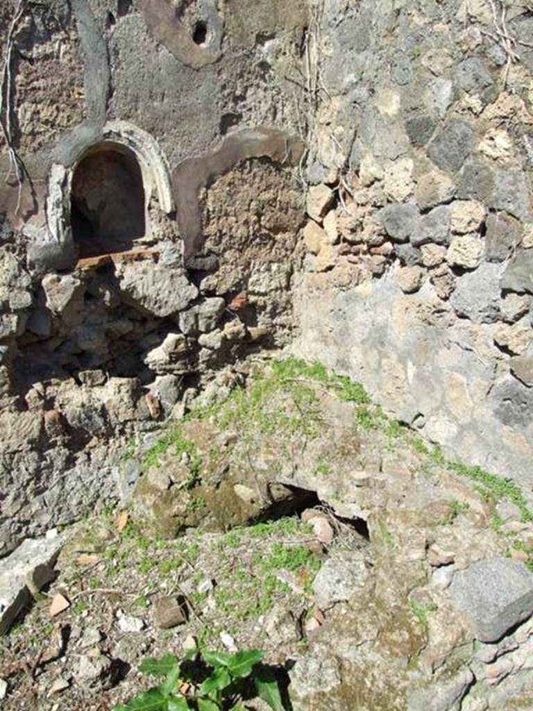 VIII.5.5 Pompeii. March 2009. Room 30. Kitchen, North west corner, with Niche and bench or hearth.