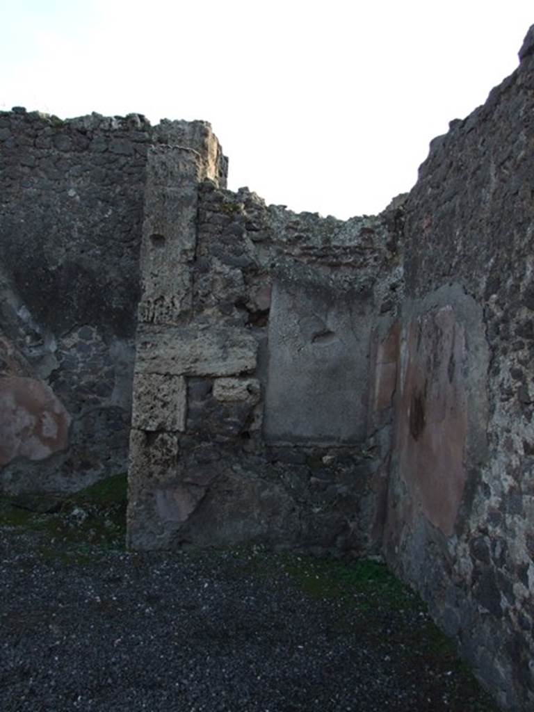 VIII.5.4 Pompeii. December 2007. South-west corner of shop. According to Eschebach this is the area of an “open rear room with niche”. According to Boyce, Fiorelli reported that this shop had a “nicchia dei Penati”, which Boyce said was in ruins (c.1937?).
See Eschebach, L., 1993. Gebäudeverzeichnis und Stadtplan der antiken Stadt Pompeji. Köln: Böhlau. (p.380)
See Boyce G. K., 1937. Corpus of the Lararia of Pompeii. Rome: MAAR 14. (p.77, no.367)