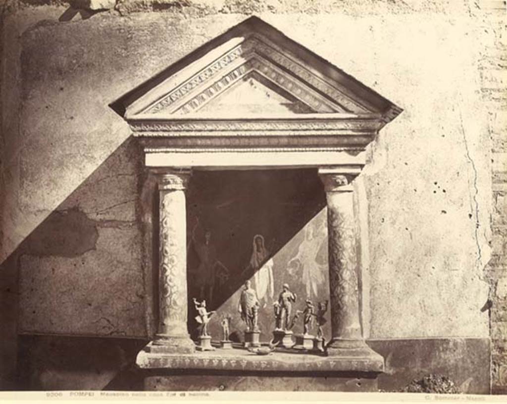 VIII.5.37 Pompeii. c. 1880-1890. G. Sommer no. 9206.
Lararium showing Genius, the Lares, statuettes and lamp. Photo courtesy of Rick Bauer.