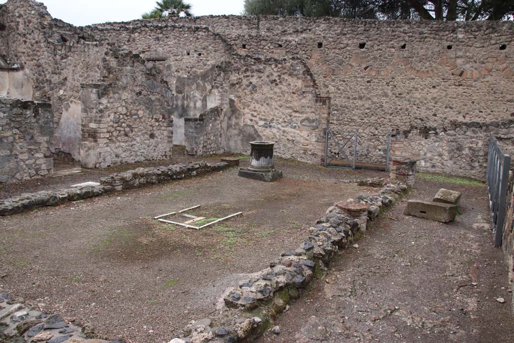 VIII.6.10 Pompeii. October 2020. Looking south-west across peristyle area. Photo courtesy of Klaus Heese.
According to Boyce (who numbers it as VIII.7.9) –
In the peristyle against the wall to the right of the entrance doorway from the street, stands a projecting base (h.1.15, w.1.40, d.0.30).
Traces of original covering with slabs of marble are still to be seen and above it are the remains of a vanished lararium painting.
The top of the pilaster was apparently meant to serve as altar for offerings.
Nearby was found a small cylindrical altar of tufa (diam.0.28, h.0.32), which Mau supposes was used instead of the top of the pilaster in the last days of the city.
See Bull. Inst. 1884, 183.
See Boyce G. K., 1937. Corpus of the Lararia of Pompeii. Rome: MAAR 14. (p.78, no. 375).