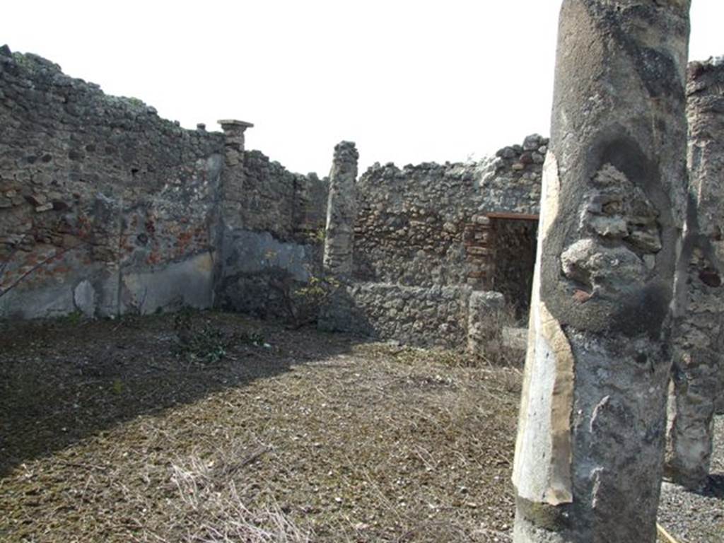IX.2.17 Pompeii. March 2009. Room 9, garden area. Looking north-west towards north side and columns at the west end.
According to Boyce, the two columns at the west end of the north row were connected by a low wall (present height 1.50).
On the south side of this wall, facing the open area, was painted in red a simple aedicula with pediment (h.1.10.w.1.70).
Within the aedicula were painted two yellow serpents confronted at an altar.
See Boyce G. K., 1937. Corpus of the Lararia of Pompeii. Rome: MAAR 14. (p. 81, no. 397B).