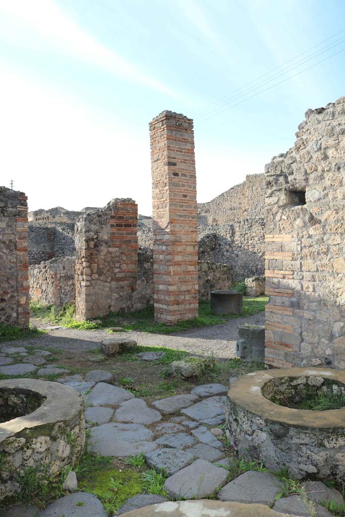 IX.3.12 Pompeii. December 2018.
Looking north-west towards rectangular pilaster opposite the oven.
Photo courtesy of Aude Durand.