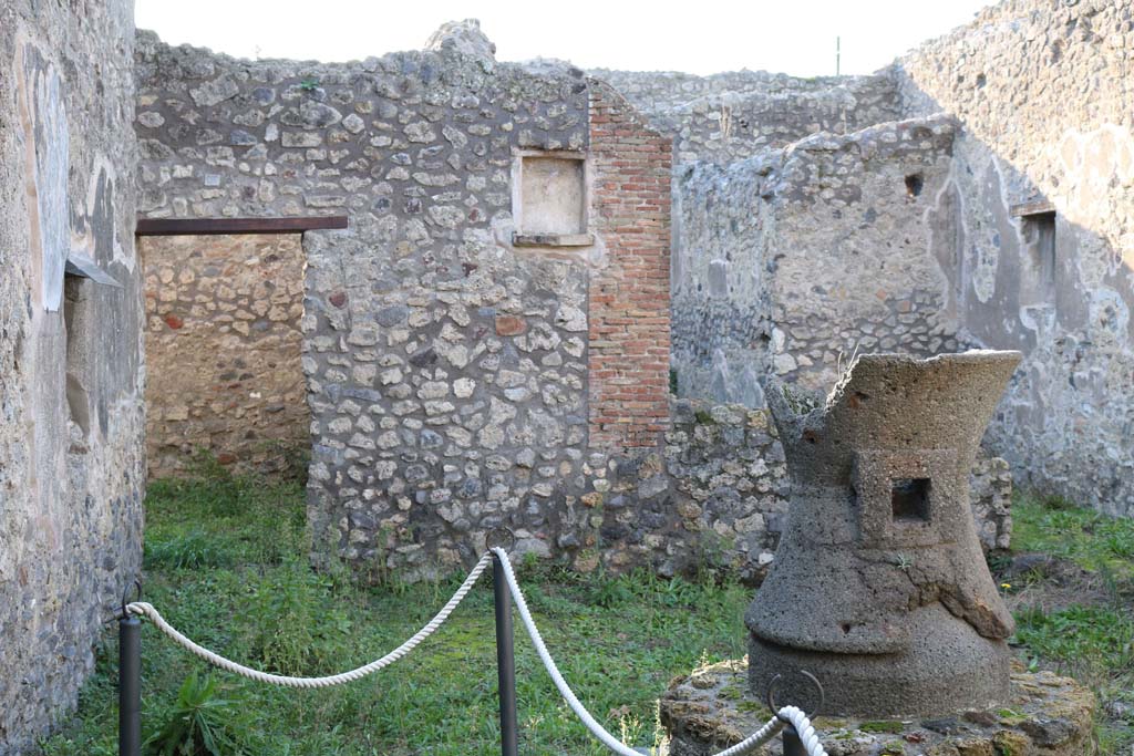 IX.3.20 Pompeii. December 2018.
Room 1, looking west towards doorway to room 9 and niche on west wall. Photo courtesy of Aude Durand.
