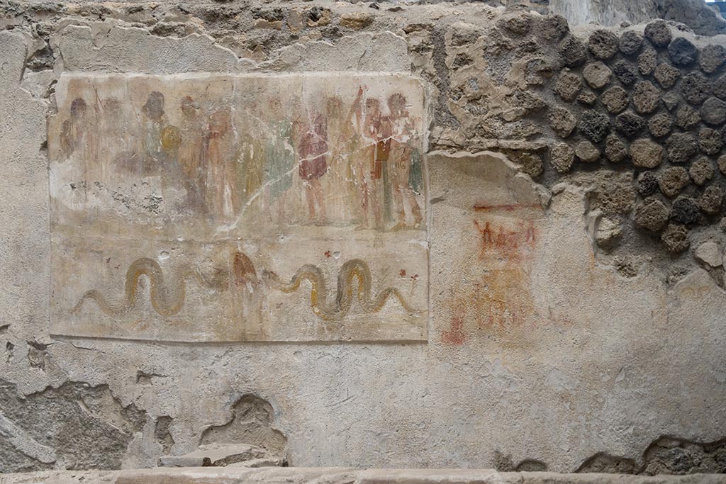 IX.12.6 Pompeii. July 2024.
Room “n1”, west wall with lararium painting, on the right is the preparatory sketch. Photo courtesy of Johannes Eber.