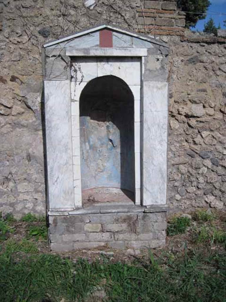 I.2.17 Pompeii. September 2010. Shrine/aedicula against east wall, looking east. Photo courtesy of Drew Baker.
According to Boyce, this may have been built as a lararium, or simple as a decorative aedicula.
See Boyce G. K., 1937. Corpus of the Lararia of Pompeii. Rome: MAAR 14. (p.22, no.10, pl.37,2)