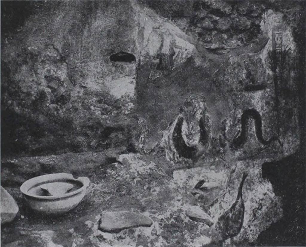 I.10.18 Pompeii. Lararium painting on south wall of the kitchen beside the hearth.
See Notizie degli Scavi di Antichità, 1934, p. 344, and fig.38.