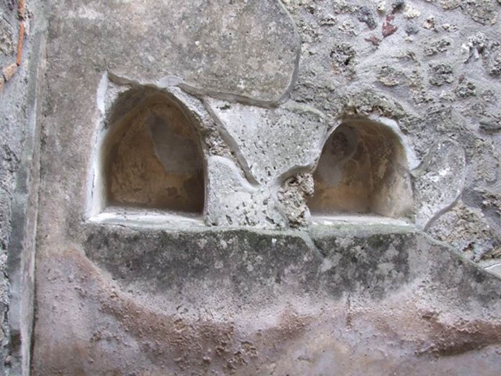 I.12.11 Pompeii. December 2007. Room with two niches in south wall.
